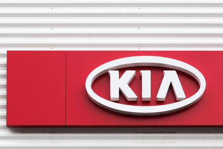 Macon, France - May 27, 2018: Kia Motors on a wall of a dealership. Kia Motors Corporation...