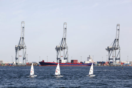 Aarhus, Denmark - August 7, 2018: Laser radial sailing ships in the harbor of Aarhus, Denmark