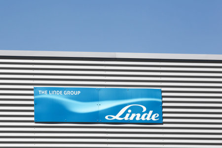 Saint Priest, France - September 8, 2018: Linde group logo on a wall. The Linde group is a German...