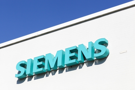 Tilst, Denmark - April 19, 2019: Siemens logo on a facade. Siemens is a german multinational. The principal divisions of the company are industry, energy, healthcare, infrastructure and citiesのeditorial素材