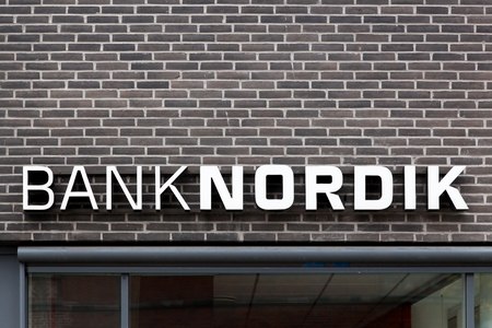 Odense, Denmark - October 6, 2018: BankNordik sign on a wall. BankNordik is a Faroe Islands-based financial services company that provides banking and insurance servicesのeditorial素材