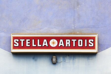 Trept, France - June 19, 2019: Stella Artois logo on a wall. Stella Artois is a Belgian pilsner which was first brewed by Brouwerij Arrouwerij Artois in Leuven, Belgium in 1926のeditorial素材