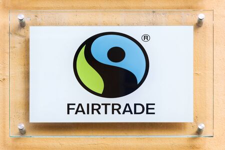 Copenhagen, Denmark - August 3, 2019: Fair Trade logo on a wall. Fair trade is an institutional arrangement designed to help producers in developing countries achieve better trading conditionsのeditorial素材