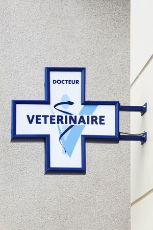 Dardilly, France - August 15, 2019: Veterinary logo on a wall in Franceのeditorial素材