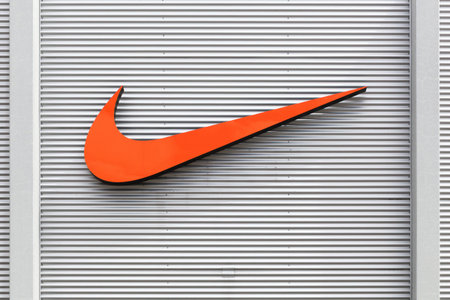 Bremen, Germany - July 2, 2017: Nike logo on a facade of a store. Nike is an American company...