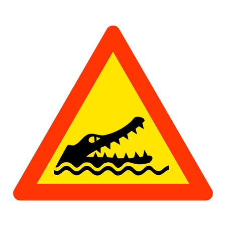 Warning crocodiles area road signの写真素材