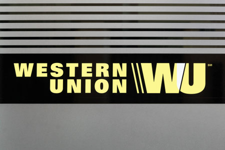 Lyon, France- July 19, 2018: Western Union sign on a facade. The Western Union company is an...