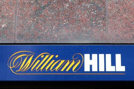 London, United Kingdom - September 25, 2019: William Hill logo on a wall. William Hill is a bookmaker based in London, Englandのeditorial素材