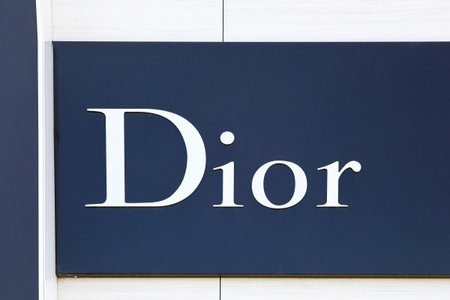 Nimes, France - July 1, 2018: Dior logo on a wall. Dior is a French luxury goods company controlled...