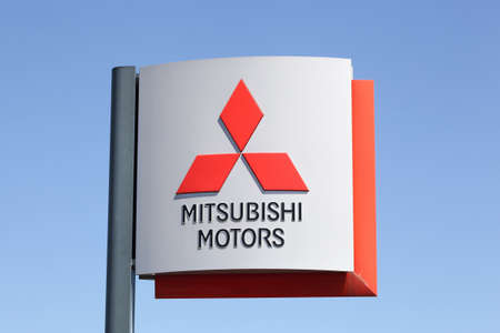 Roanne, France - May 31, 2020: Mitsubishi logo on a panel. Mitsubishi Motors Corporation is a multinational automotive manufacturer headquartered in Tokyo, Japanのeditorial素材