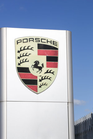 Risskov, Denmark - May 11, 2019: Porsche logo in front of a car dealer. Porsche is a german...