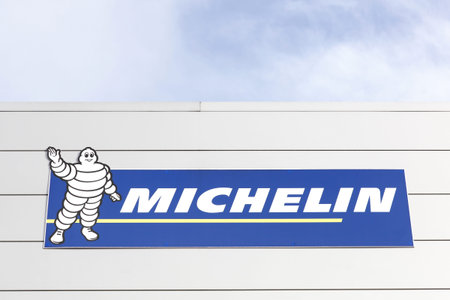 Macon, France - January 30, 2016: Michelin logo on a wall. Michelin is a tire manufacturer based in...
