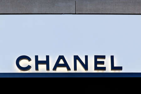Copenhagen, Denmark - April 2, 2019: Chanel logo on a wall. Chanel is a French high fashion house that specializes in haute couture and ready-to-wear clothes, luxury goods and fashion accessoriesのeditorial素材