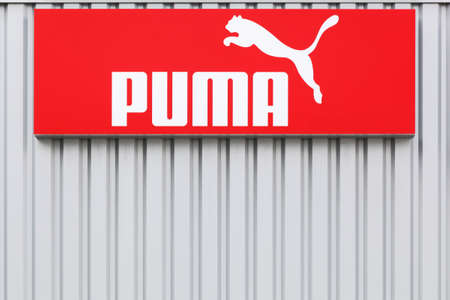 Bremen, Germany - July 2, 2017: Puma logo on a wall. Puma is a major german multinational company that produces athletic, casual footwear, sportswear, headquartered in Germanyのeditorial素材