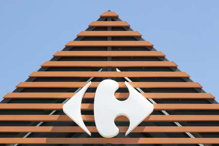Mably, France - May 31, 2020:  Carrefour sign on a wall. Carrefour is a french multinational retailer headquartered in France and it is one of the largest hypermarket chains in the worldのeditorial素材