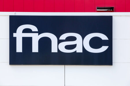 Saint Etienne, France - June 21, 2020: Fnac logo on a wall. Fnac is a large French retail chain selling cultural and electronic products, founded by Andre Essel and Max Theret in 1954のeditorial素材