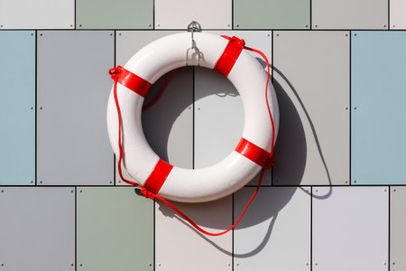 Lifebuoy hanging on a wall in Denmarkの写真素材
