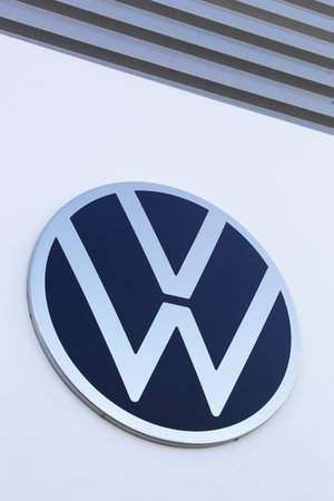 Belleville, France - September 13, 2020: New Volkswagen logo on a wall. Volkswagen is a German car...