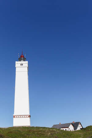 View of Blavand lighthouse in Denmarkの写真素材