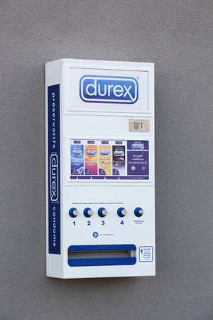Belleville, France - August 23, 2020: Durex condoms automat on a wall in France. Durex is a...