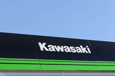 Lyon, France - July 3, 2016: Kawasaki sign on a wall. Kawasaki is a Japanese public multinational corporation primarily known as a manufacturer of motorcycles, heavy equipment, aerospace and defenseのeditorial素材