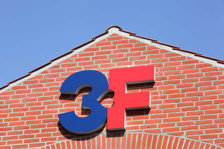Aarhus, Denmark - April 18, 2021: 3F sign on a building. 3F is the united federation of workers, a Danish labor unionのeditorial素材