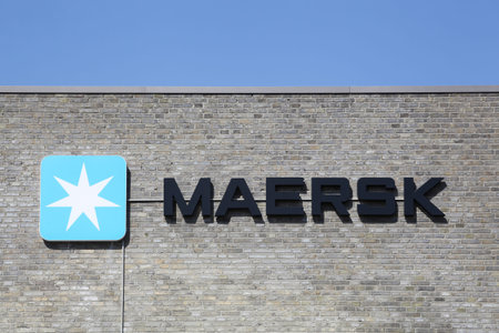 Tilst, Denmark - April 18, 2021: Maersk logo on a building. Maersk company based in Copenhagen,...