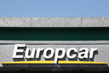 Aarhus, Denmark - April 19, 2019: Europcar logo on a wall. Europcar is a French car rental company...