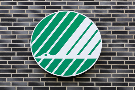 Stilling, Denmark - July 18, 2019: The Nordic swan mark on a wall. The Nordic ecolabel or Nordic...