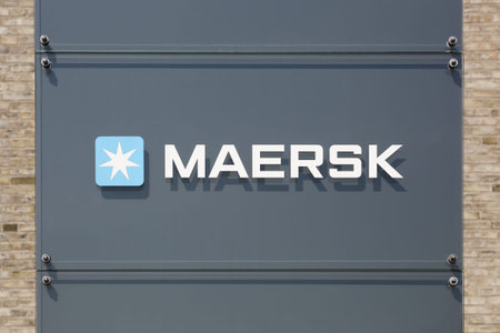 Tilst, Denmark - April 18, 2021: Maersk logo on a building. Maersk company based in Copenhagen, Denmark, is the largest container ship operator in the worldのeditorial素材