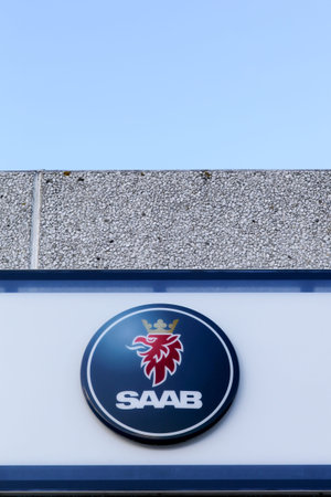 Risskov, Denmark - January 17, 2016: Saab logo on a wall. Saab was a manufacturer of automobiles...
