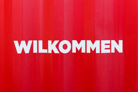 Welcome sign on a container called wilkommen in german languageの写真素材