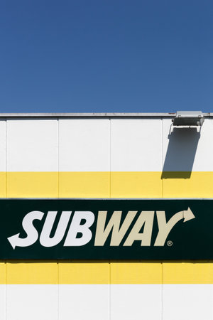 Lozanne, France - July 1, 2016: Subway logo on a facade. Subway is an American fast food restaurant franchise that primarily sells submarine sandwiches and saladsのeditorial素材