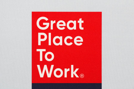 Odder, Denmark - January 14, 2022: Great place to work logo on a wall. Great place to work is the global authority on workplace cultureのeditorial素材