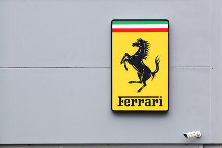 Limonest, France - September 6, 2020: Ferrari logo on a facade of a dealer. Ferrari is an Italian luxury sports car manufacturer based in Maranello, Italyのeditorial素材
