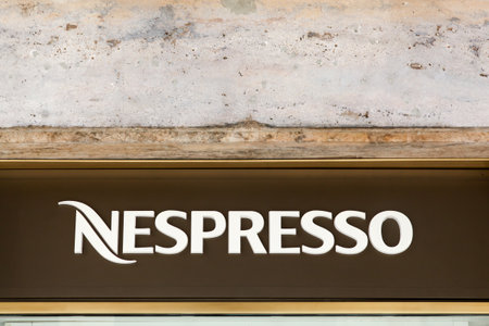 Turin, Italy - July 10, 2023: Nespresso logo on a store. Nespresso is the brand name of Nestle Nespresso., an operating unit of the Nestle Group, based in Lausanne, Switzerlandのeditorial素材