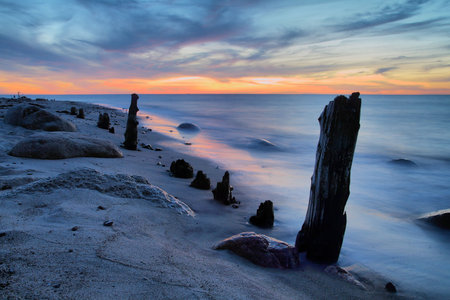Old Groyne on the beach of the Baltic Sea.の写真素材