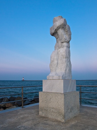 Statue on the Mole in Warnemuende (Germany).の写真素材