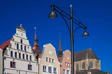 Lantern and historical buildings in Rostock  Germany  の写真素材