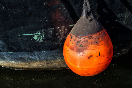 Fender on a boat in a port の写真素材