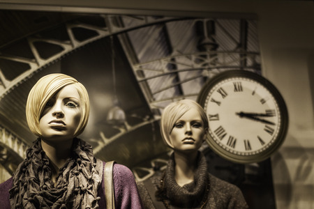 Display window puppets with clock.の写真素材