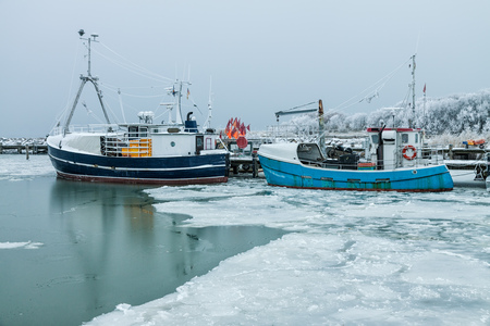 Fishing boats in the port of Timmdorf (Germany).の写真素材