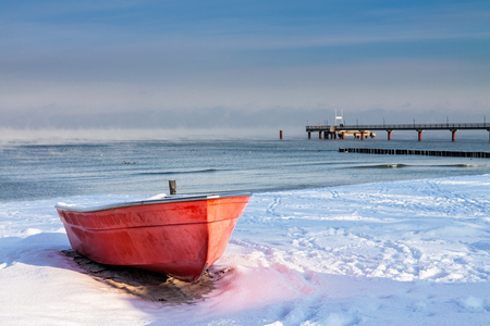 Fishing boat in Zingst in winter.の写真素材