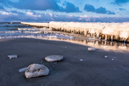 Groynes on shore of the Baltic Sea.の写真素材