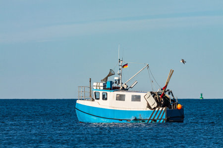 A fishing boat on the Baltic Sea in Warnemuende (Germany).の写真素材
