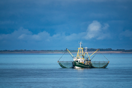 Shrimp boat on the North Sea, Germany.の写真素材