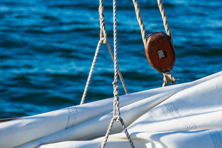 Detail of a sailing boat in the port.