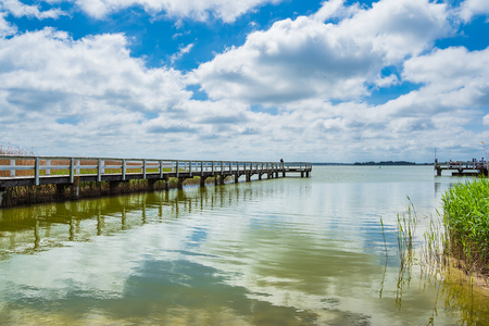 Landing stage on a lake with blue sky.のeditorial素材