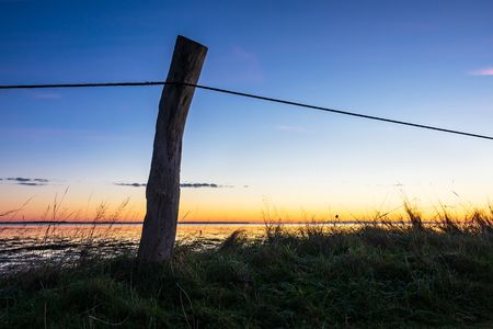 Sunrise on the North Sea coast on the island Amrum, Germany.の写真素材