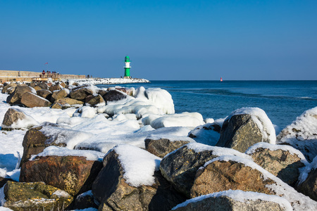 Mole in winter time in Warnemuende, Germany.の写真素材